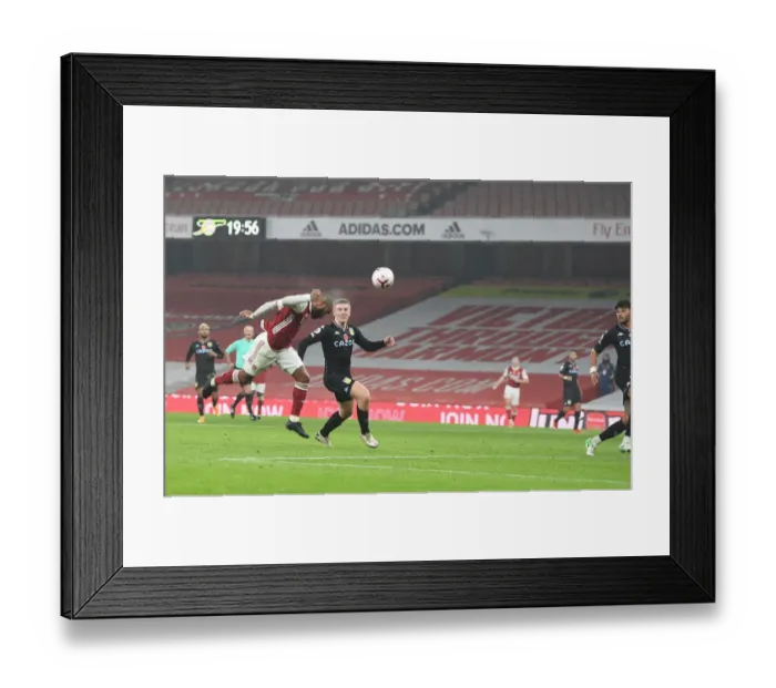 Framed Print : Arsenal vs Aston Villa: Lacazette Heads in Empty Emirates Stadium, Premier League 2020-21 Framed Print : Arsenal vs Aston Villa: Lacazette Heads in Empty Emirates Stadium, Premier League 2020-21