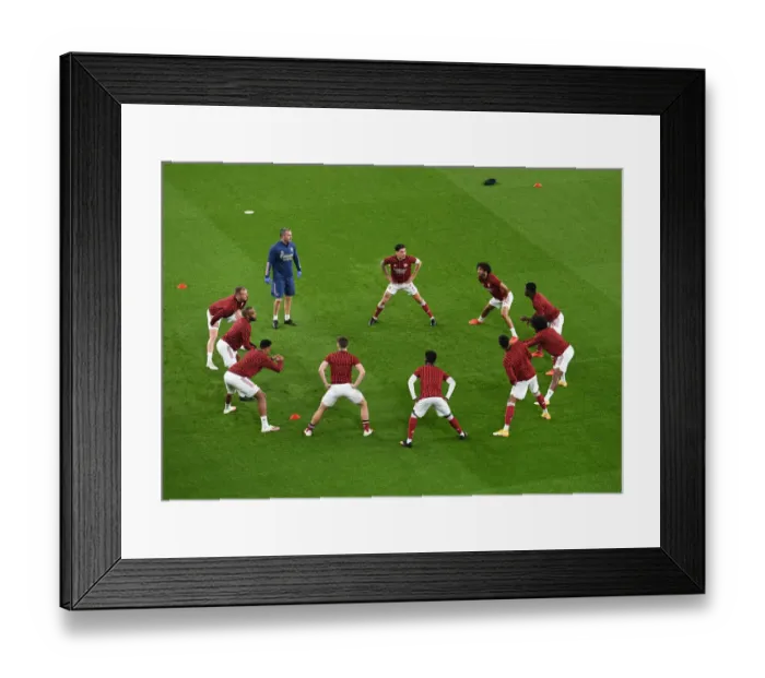 Framed Print : Arsenal vs Aston Villa: Premier League - Pre-Match Warm-Up at Emirates Stadium