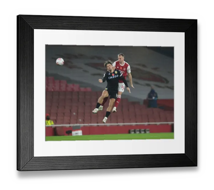 Framed Print : Arsenal vs Aston Villa: Holding vs Grealish - Premier League Clash at Emirates Stadium