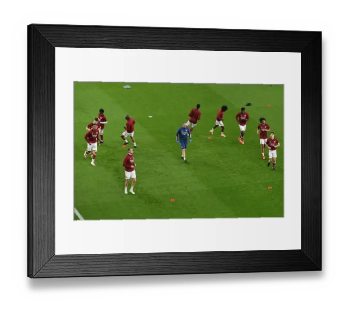 Framed Print : Premier League Showdown: Arsenal's Pre-Match Warm-Up vs Aston Villa