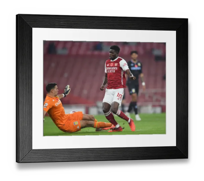 Framed Print : Arsenal vs Aston Villa: Thomas Partey vs Emi Martinez Battle in the Premier League Framed Print : Arsenal vs Aston Villa: Thomas Partey vs Emi Martinez Battle in the Premier League