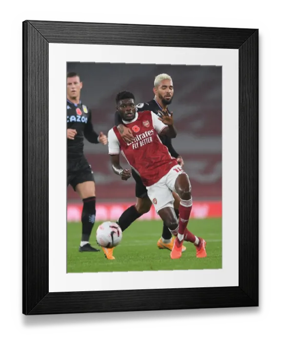 Framed Print : Arsenal vs Aston Villa: Thomas Partey vs Douglas Luiz Battle in Premier League Clash Framed Print : Arsenal vs Aston Villa: Thomas Partey vs Douglas Luiz Battle in Premier League Clash