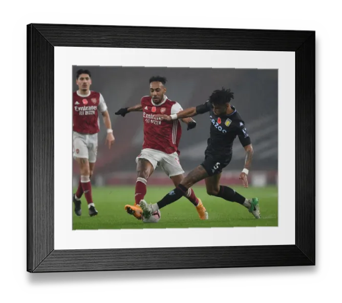 Framed Print : Arsenal vs Aston Villa: Aubameyang vs Mings - Premier League Clash at Emirates Stadium