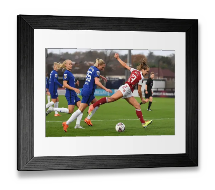 Framed Print : Arsenal vs. Chelsea: Intense Battle in FA WSL Match