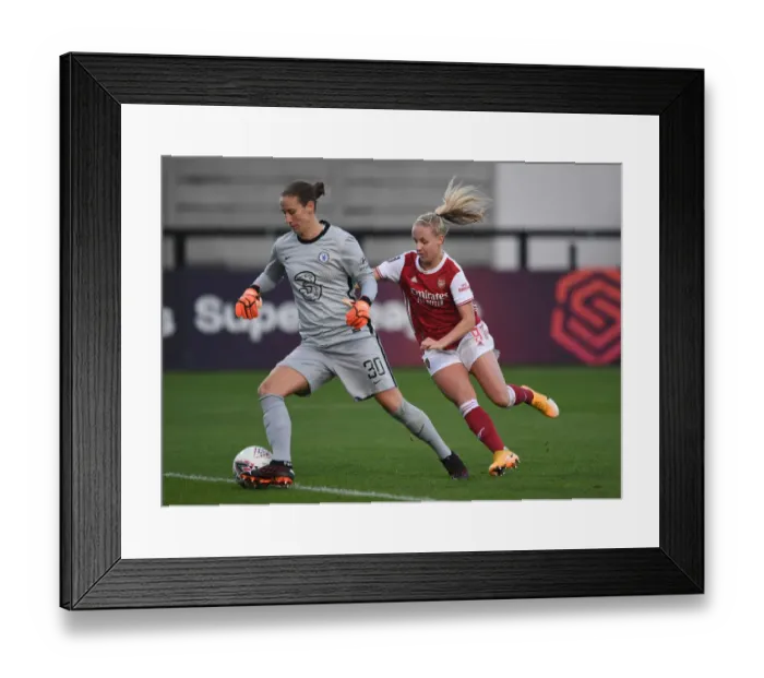 Framed Print : Arsenal's Beth Mead Chases Down Chelsea's Goalkeeper in FA WSL Thriller: A High-Stakes Showdown Framed Print : Arsenal's Beth Mead Chases Down Chelsea's Goalkeeper in FA WSL Thriller: A High-Stakes Showdown