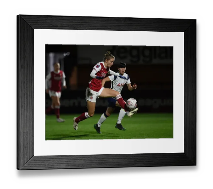 Framed Print : Rivalry Unleashed: Miedema vs. Neville in Empty Arsenal Stands - FA Cup Clash Between Arsenal and Tottenham Women Framed Print : Rivalry Unleashed: Miedema vs. Neville in Empty Arsenal Stands - FA Cup Clash Between Arsenal and Tottenham Women