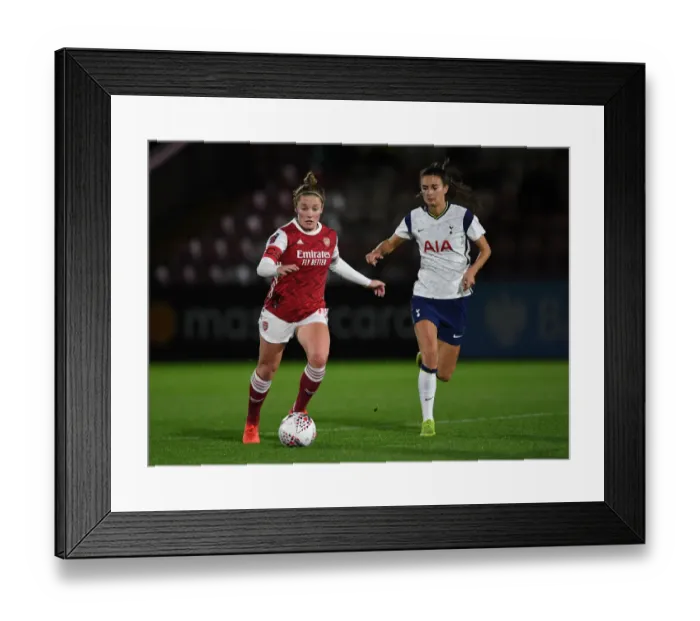 Framed Print : Arsenal vs. Tottenham Women's FA Continental League Cup Clash Amidst Empty Stands Framed Print : Arsenal vs. Tottenham Women's FA Continental League Cup Clash Amidst Empty Stands