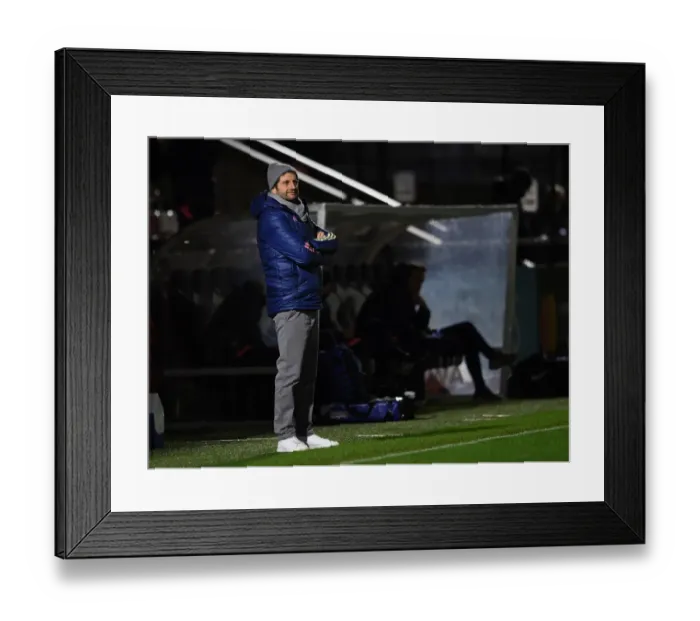 Framed Print : Conti Cup Clash: Arsenal Women vs. Tottenham Hotspur Women in Empty Stands