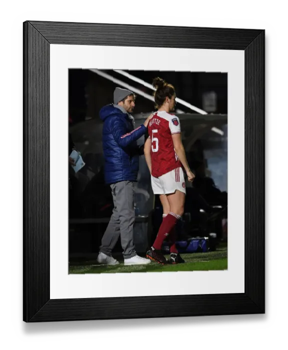 Framed Print : Arsenal Women's Manager Montemurro Gives Instructions in Empty Stands: Arsenal vs. Tottenham (FA WSL Cup)