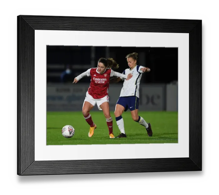 Framed Print : Arsenal vs. Tottenham Women's Clash in Empty Meadow Park: FA Womens Continental League Cup
