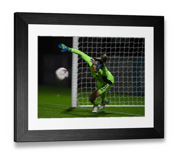 Framed Print : Arsenal vs. Tottenham Women's FA Cup Clash: Empty Stands and Dramatic Penalty Shootout Decided by Lydia Williams
