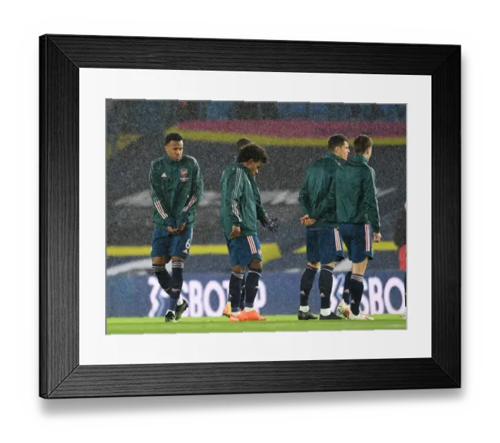 Framed Print : Arsenal's Gabriel Magalhaes and Willian Prepare for Leeds United Clash in Premier League