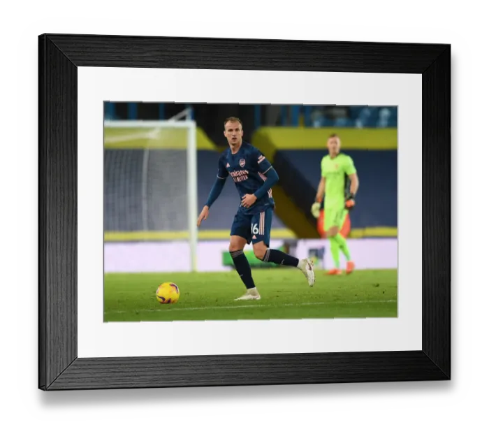 Framed Print : Arsenal's Rob Holding in Action against Leeds United - Premier League Showdown (November 2020)