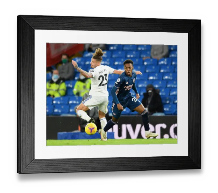 Framed Print : Clash of Titans: Leeds United vs. Arsenal - Battle for Premier League Supremacy Framed Print : Clash of Titans: Leeds United vs. Arsenal - Battle for Premier League Supremacy