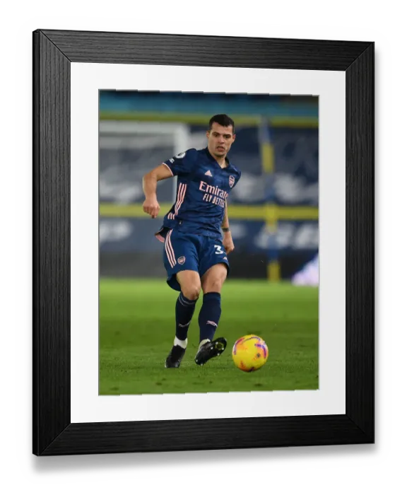 Framed Print : Granit Xhaka in Action: Leeds United vs. Arsenal, Premier League 2020-21 Framed Print : Granit Xhaka in Action: Leeds United vs. Arsenal, Premier League 2020-21