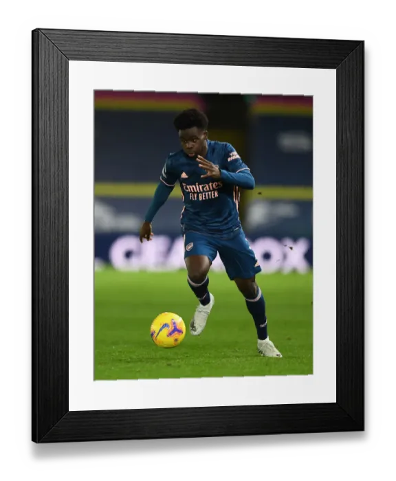 Framed Print : Bukayo Saka's Brilliant Performance: Arsenal Triumphs Over Leeds United, Premier League 2020-21