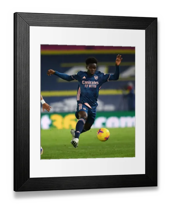 Framed Print : Bukayo Saka's Star Performance: Arsenal Triumphs Over Leeds United, Premier League 2020-21