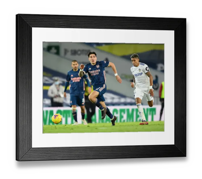 Framed Print : Hector Bellerin vs Raphinha: Battle at Elland Road - Leeds United vs Arsenal, Premier League 2020-21