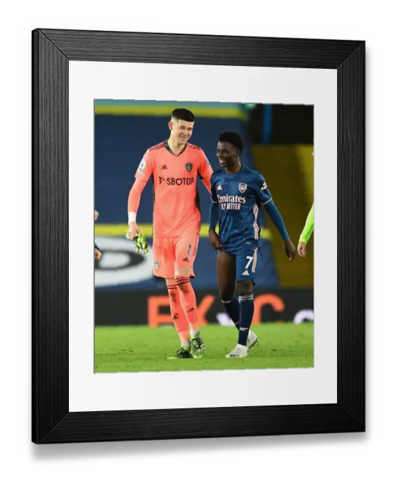Framed Print : Leeds United vs. Arsenal: Bukayo Saka and Illan Meslier Share a Light-Hearted Moment Amidst Premier League Tension Framed Print : Leeds United vs. Arsenal: Bukayo Saka and Illan Meslier Share a Light-Hearted Moment Amidst Premier League Tension