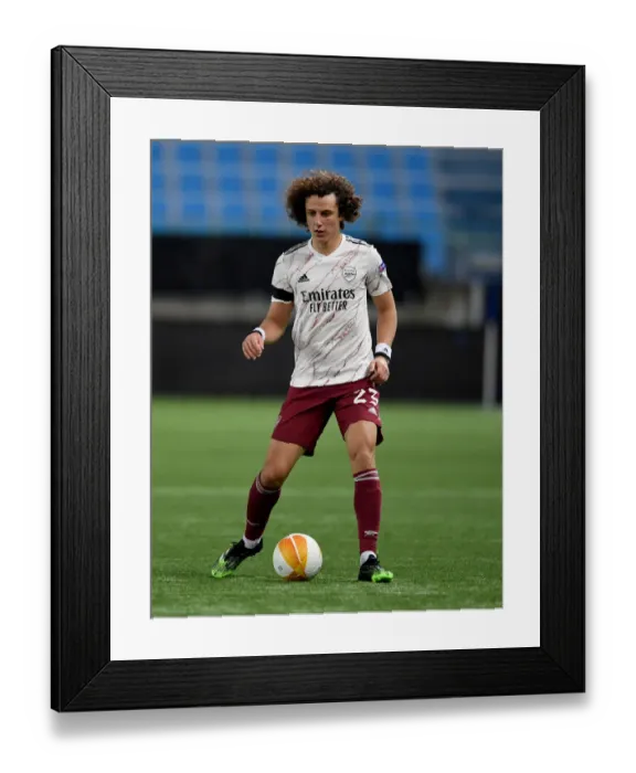 Framed Print : Arsenal's David Luiz in Action against Molde FK in UEFA Europa League Framed Print : Arsenal's David Luiz in Action against Molde FK in UEFA Europa League