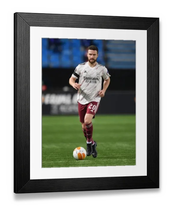 Framed Print : Arsenal's Mustafi Faces Off Against Molde in Europa League Group Stage