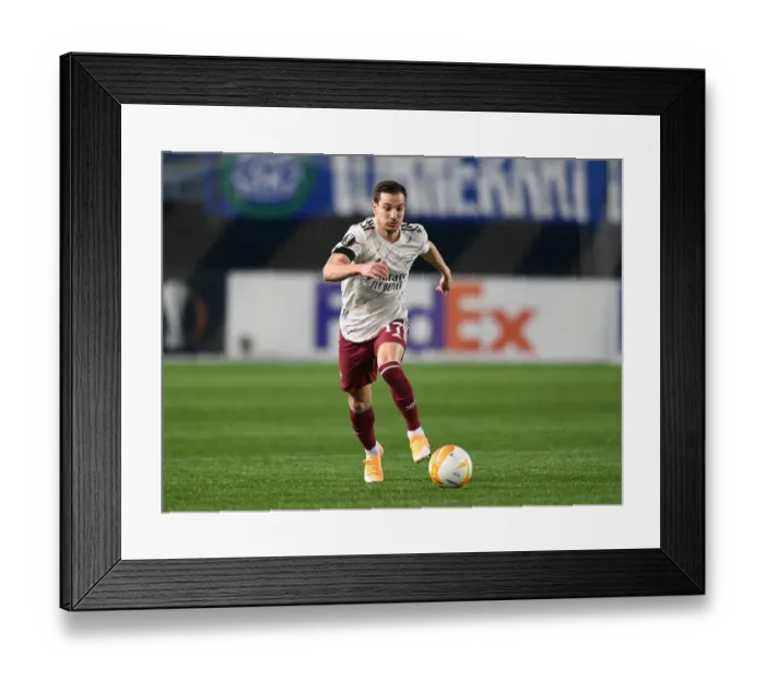 Framed Print : Arsenal's Cedric Soares in Action during Europa League Clash against Molde FK Framed Print : Arsenal's Cedric Soares in Action during Europa League Clash against Molde FK
