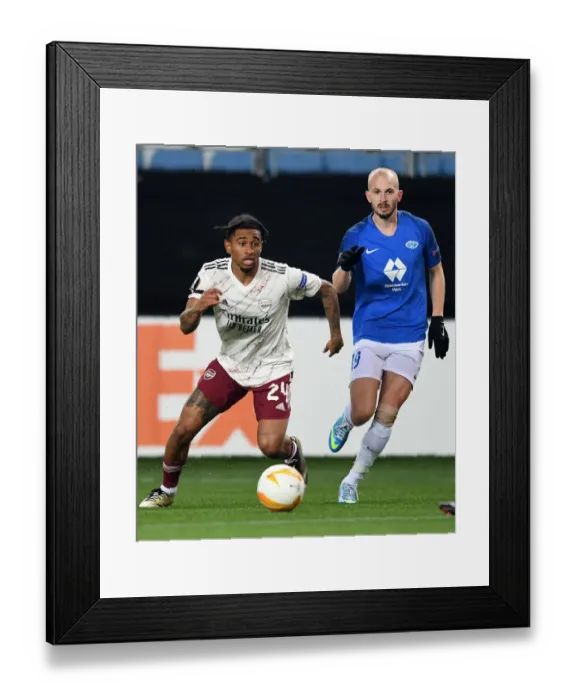 Framed Print : Reiss Nelson Faces Off Against Eirik Hestad: Molde FK vs. Arsenal FC, UEFA Europa League 2020-21 Framed Print : Reiss Nelson Faces Off Against Eirik Hestad: Molde FK vs. Arsenal FC, UEFA Europa League 2020-21