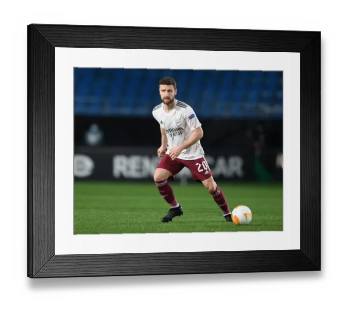 Framed Print : Mustafi Clashes in Europa League: Arsenal vs Molde Showdown