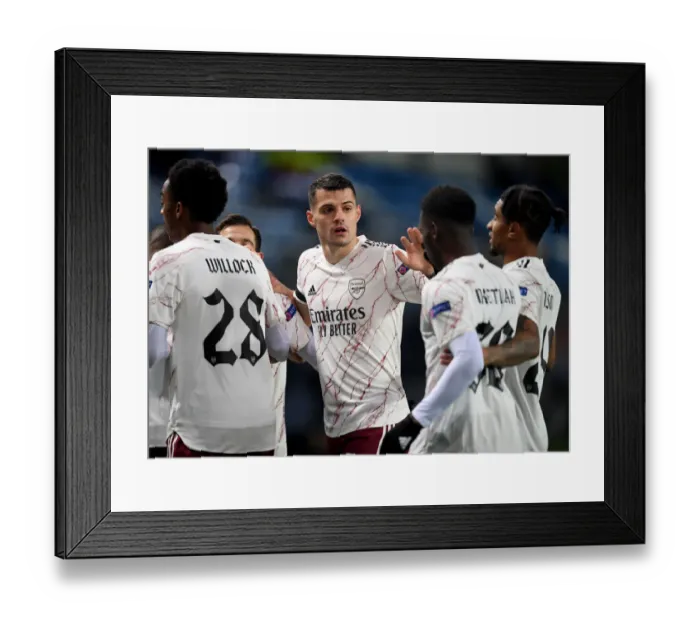 Framed Print : Granit Xhaka in Action: Arsenal's Europa League Battle against Molde FK