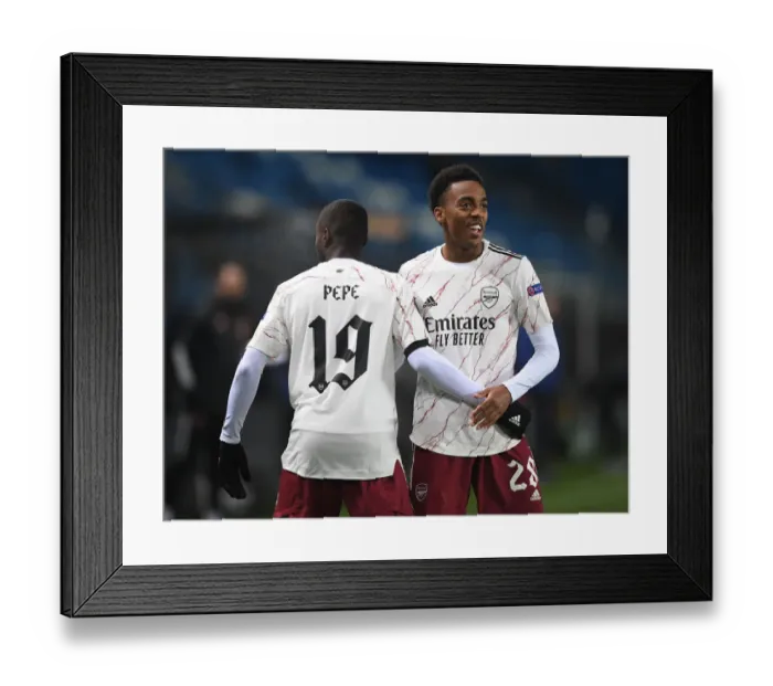 Framed Print : Pepe and Willock Celebrate Arsenal's First Goal Against Molde in Europa League