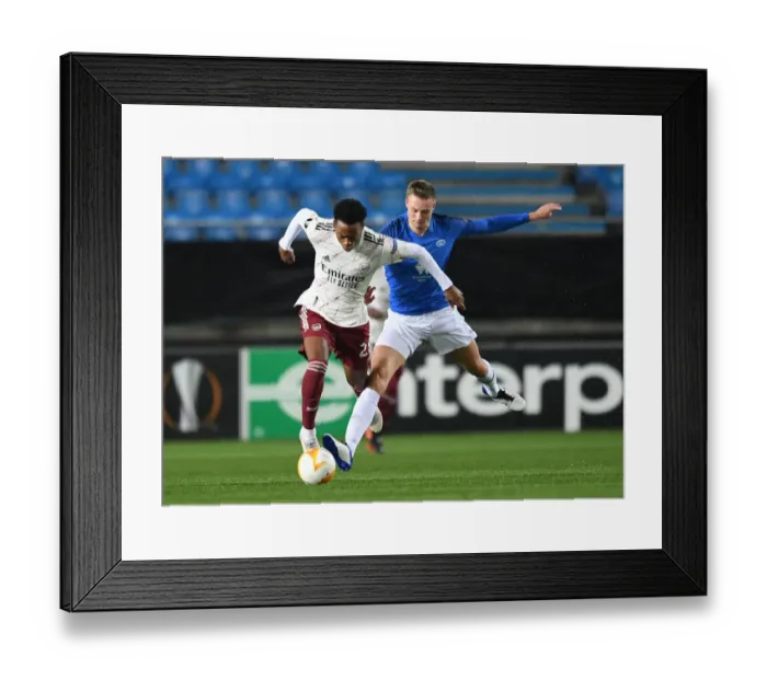 Framed Print : Joe Willock Clashes with Stian Gregersen: Molde FK vs Arsenal FC, UEFA Europa League 2020-21
