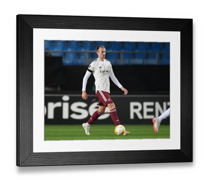 Framed Print : Arsenal's Rob Holding in Action against Molde FK in UEFA Europa League
