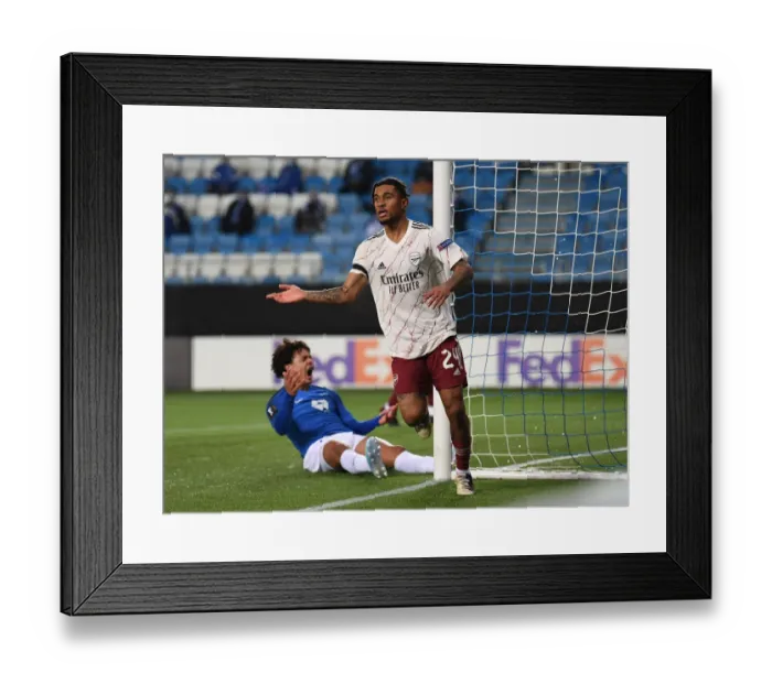 Framed Print : Arsenal's Nelson Scores in Europa League Victory over Molde FK Framed Print : Arsenal's Nelson Scores in Europa League Victory over Molde FK