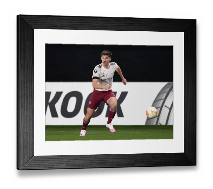 Framed Print : Arsenal's Kieran Tierney in Action against Molde FK in UEFA Europa League Framed Print : Arsenal's Kieran Tierney in Action against Molde FK in UEFA Europa League