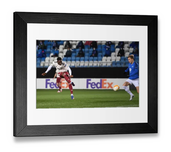 Framed Print : Arsenal's Flo Balogun Scores Third Goal in Europa League Victory over Molde FK