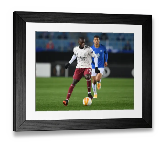 Framed Print : Nicolas Pepe in Action: Molde FK vs Arsenal, UEFA Europa League 2020-21