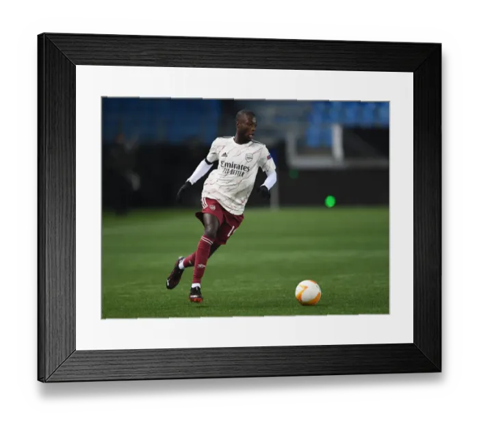 Framed Print : Arsenal's Nicolas Pepe in Action against Molde FK in UEFA Europa League Group Stage Framed Print : Arsenal's Nicolas Pepe in Action against Molde FK in UEFA Europa League Group Stage
