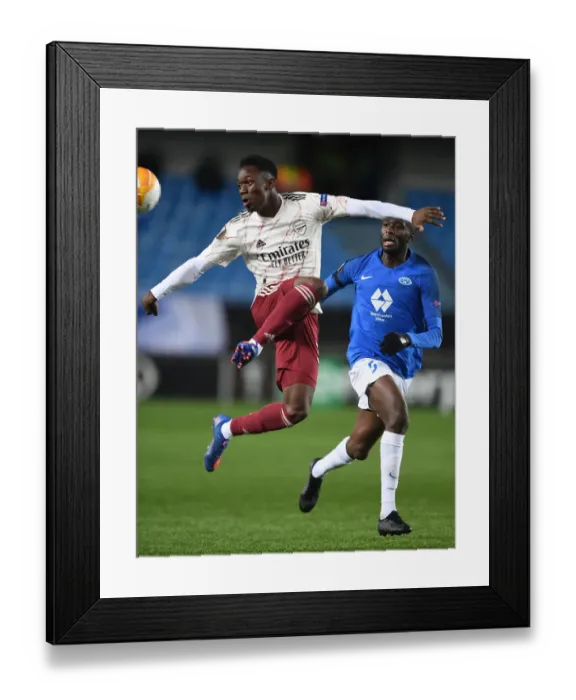 Framed Print : Arsenal's Flo Balogun in Action against Molde FK in UEFA Europa League Group Stage