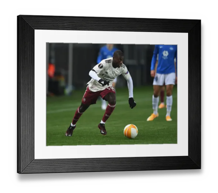 Framed Print : Nicolas Pepe in Action: Arsenal vs Molde, Europa League 2020-21 Framed Print : Nicolas Pepe in Action: Arsenal vs Molde, Europa League 2020-21