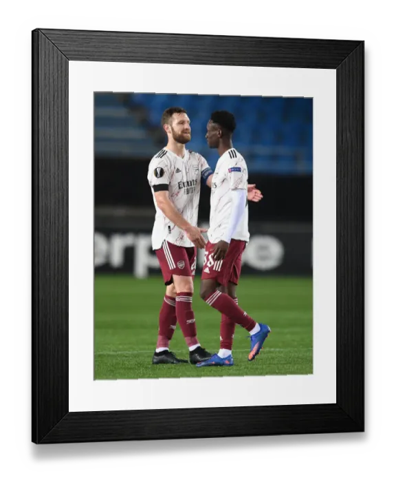 Framed Print : Arsenal Celebrate Victory Over Molde in Europa League: Mustafi and Balogun