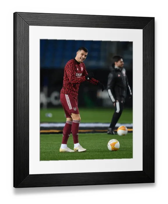 Framed Print : Arsenal's Granit Xhaka Warming Up Ahead of Molde FK Clash in Europa League Framed Print : Arsenal's Granit Xhaka Warming Up Ahead of Molde FK Clash in Europa League