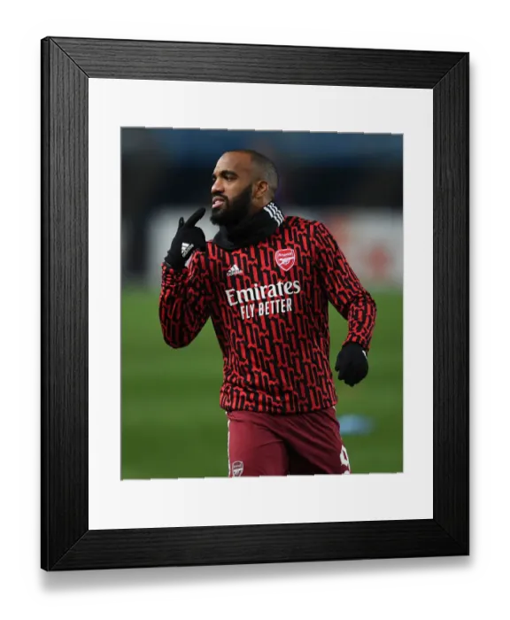 Framed Print : Arsenal's Lacazette Warming Up Ahead of Molde Clash in Europa League Framed Print : Arsenal's Lacazette Warming Up Ahead of Molde Clash in Europa League