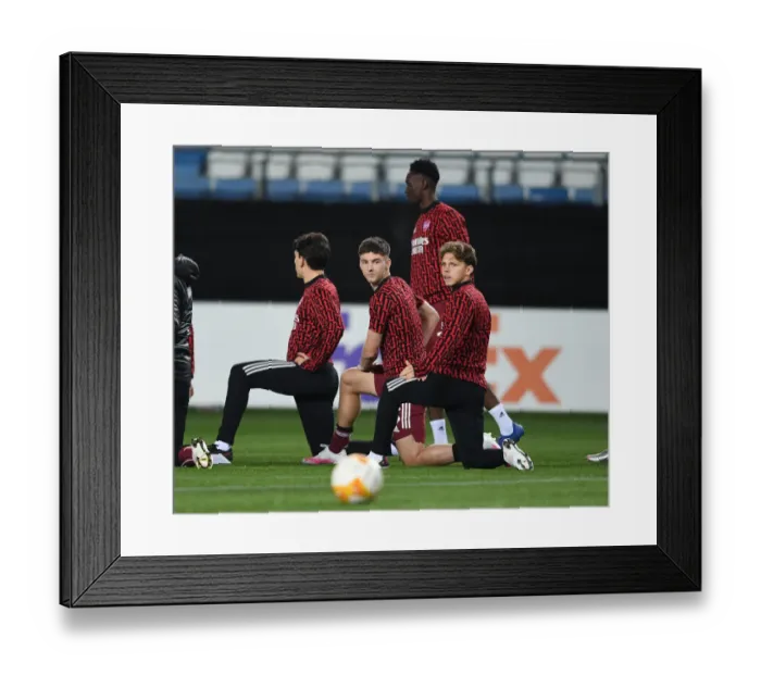 Framed Print : Arsenal FC Players Kieran Tierney and Ben Cottrell Warm Up Ahead of Molde FK Clash in UEFA Europa League