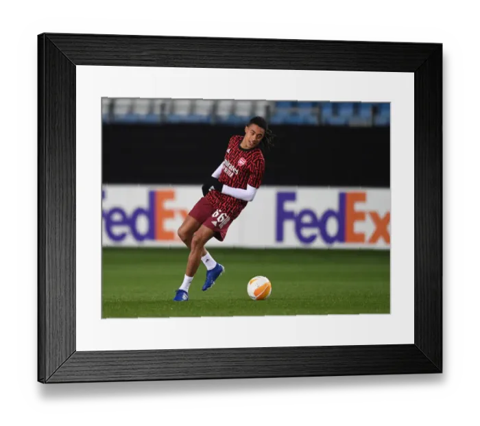 Framed Print : Arsenal's Miguel Azeez Warms Up Ahead of Molde FK Clash in Europa League
