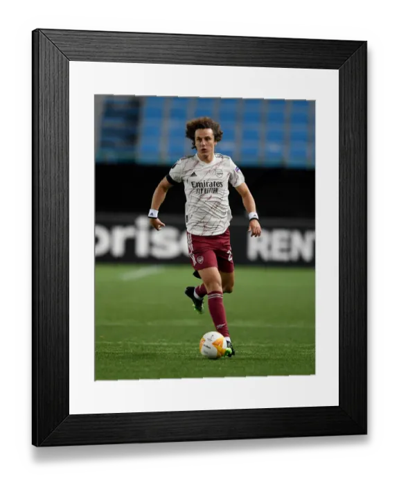 Framed Print : David Luiz in Action: Arsenal's Europa League Battle against Molde FK