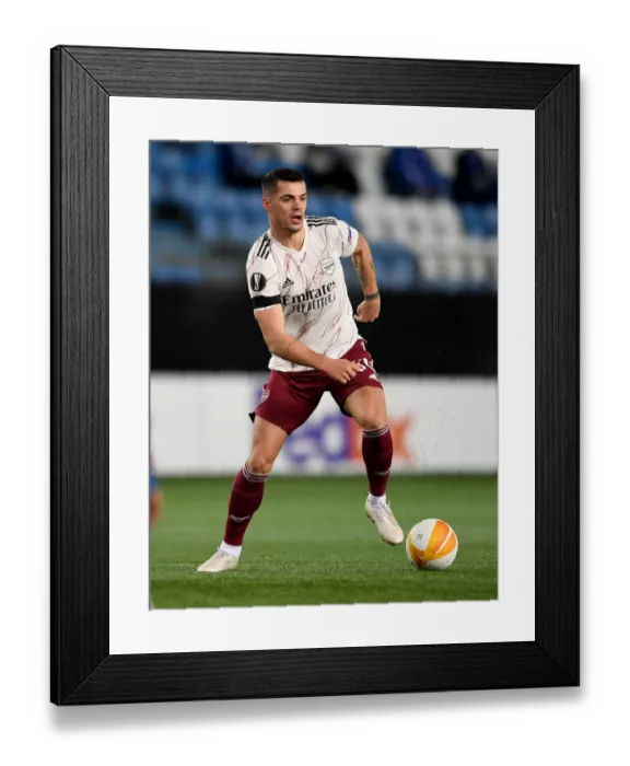 Framed Print : Granit Xhaka's Europa League Victory: Arsenal's Triumph over Molde FK Framed Print : Granit Xhaka's Europa League Victory: Arsenal's Triumph over Molde FK