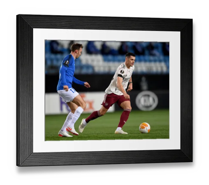 Framed Print : Granit Xhaka: Arsenal's Midfield Maestro Dazzles in Europa League Showdown against Molde FK