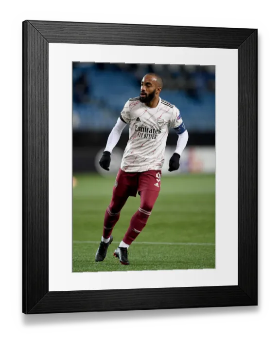 Framed Print : Arsenal's Lacazette in Action against Molde FK in Europa League Group Stage