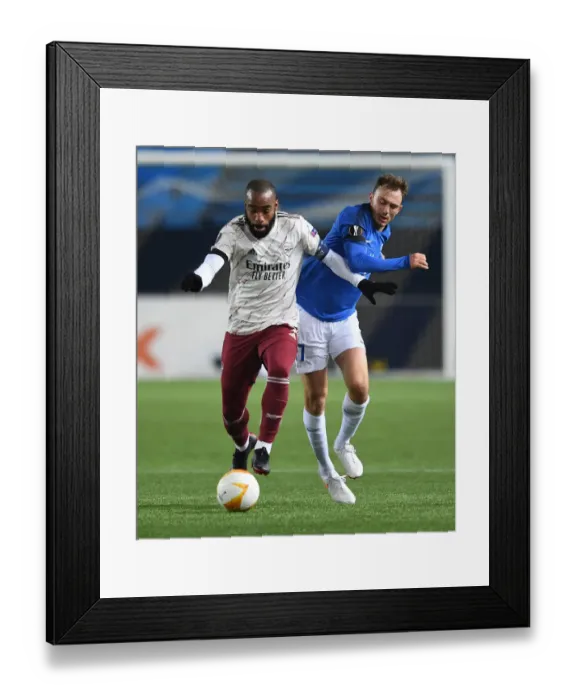 Framed Print : Alexandre Lacazette Faces Off Against Molde FK in Europa League Clash Framed Print : Alexandre Lacazette Faces Off Against Molde FK in Europa League Clash