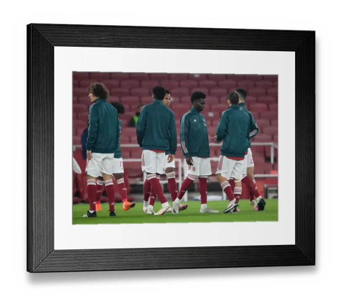 Framed Print : Arsenal's Bukayo Saka Prepares for Wolves Clash in Empty Emirates Stadium (Arsenal v Wolverhampton Wanderers 2020-21)